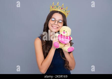 Birthday kids prom party. Girls party, funny kid in crown. Child queen wear diadem tiara. Cute little princess portrait. Stock Photo