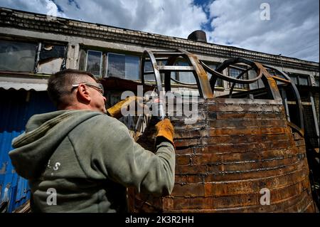 ZAPORIZHZHIA, UKRAINE - MAY 19, 2022 - Member of the Palianytsia Charity Foundation, welder Yevhen Blahun works on the 2.5-tonne monument to the bulle