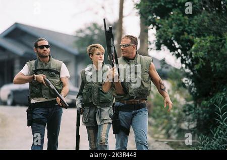 Edgar Ramirez, Keira Knightley & Mickey Rourke Film: Domino (USA/UK/FR 2005) Characters: Choco,Domino Harvey & Ed Mosbey  Director: Tony Scott 25 September 2005   **WARNING** This Photograph is for editorial use only and is the copyright of SCOTT FREE PROD. and/or the Photographer assigned by the Film or Production Company and can only be reproduced by publications in conjunction with the promotion of the above Film. A Mandatory Credit To SCOTT FREE PROD. is required. The Photographer should also be credited when known. No commercial use can be granted without written authority from the Film C Stock Photo