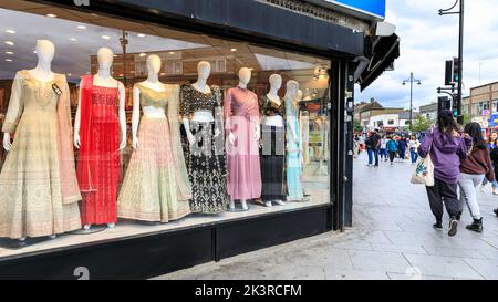 Punjabi, Indian and Asian shops and people shopping in Southall High Street, Southall, West London, England, UK Stock Photo