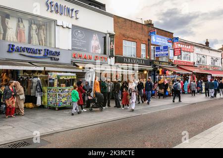 Punjabi, Indian and Asian shops and people shopping in Southall High Street, Southall, West London, England, UK Stock Photo