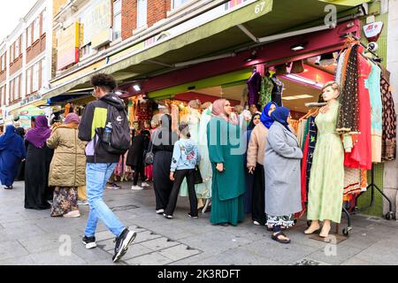 Punjabi, Indian and Asian shops and people shopping in Southall High Street, Southall, West London, England, UK Stock Photo