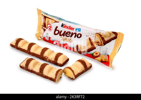 Alba, Italy - September 28, 2022: Kinder Bueno White, wafer covered with white chocolate and cocoa nibs, filled with hazelnut cream. It is a Ferrero b Stock Photo