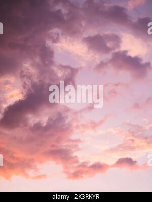 A purple and orange sunset painted across the sky Stock Photo