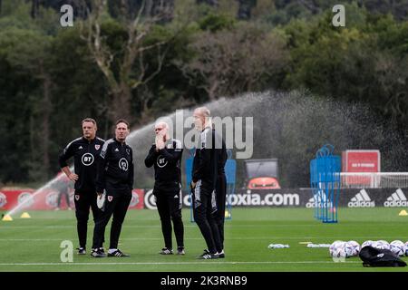 PONTYCLUN, WALES - 19 SEPTEMBER 2022: Wales’ Coach Kit Symons, Wales’ Goalkeepers’ Coach Tony Roberts, Wales’ Head of Performance Tony Strudwick, Wale Stock Photo