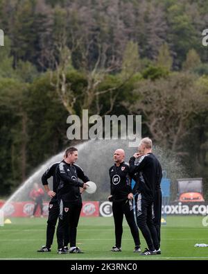 PONTYCLUN, WALES - 19 SEPTEMBER 2022: Wales’ Coach Kit Symons, Wales’ Goalkeepers’ Coach Tony Roberts, Wales’ Head of Performance Tony Strudwick, Wale Stock Photo