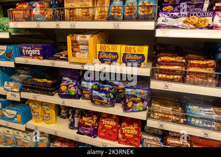 Biscuits on shelves in a British supermarket Stock Photo