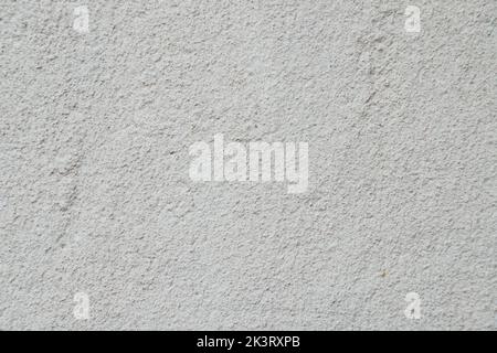 Texture of beige decorative plaster. Construction and finishing materials for repairs of walls. Background Stock Photo