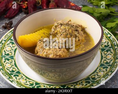 tasty traditional Azerbaijani soup kufta bozbash. Close up Stock Photo