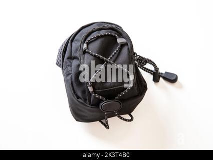 Back to school concept. Black trendy backpack isolated cutout on white background. Overhead view Stock Photo