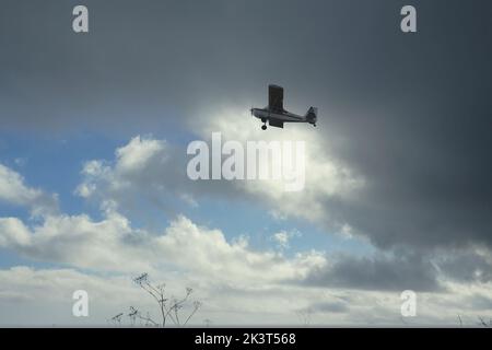 small prop plane taking off from airport Stock Photo