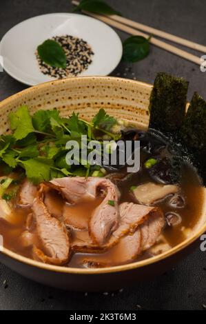 tasty asian ramen soup with beef and mushrooms Stock Photo
