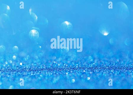 Blue glitter texture holidays background. Macro shot Stock Photo