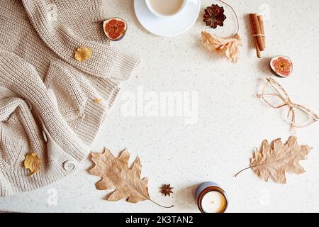 https://l450v.alamy.com/450v/2k3tan2/woman-autumn-outfit-background-with-sweater-glasess-among-figs-and-leaves-autumn-aesthetic-coffee-time-near-candle-copy-space-2k3tan2.jpg