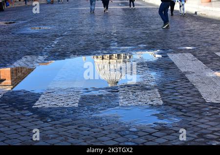 Rome, Italy. October 16, 2019. St. Peter’s Basilica (Vatican City) puddle reflection. Stock Photo