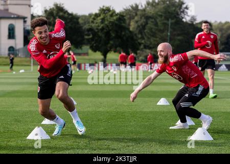 PONTYCLUN, WALES - 20 SEPTEMBER 2022: Wales' Ethan Ampadu and Wales' Jonny Williams  during a training session at the vale resort ahead of the league Stock Photo