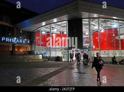 Warrington bus station interchange, at dusk with passengers, Cheshire, England, UK, WA1 1TS Stock Photo