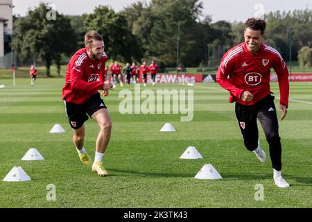 PONTYCLUN, WALES - 20 SEPTEMBER 2022: Wales' Rhys Norrington-Davies and Wales' Brennan Johnson  during a training session at the vale resort ahead of Stock Photo