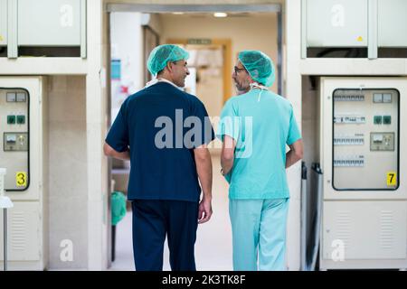 Two surgeons talking in hospital Stock Photo