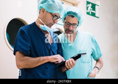 Two surgeons with tablet Stock Photo