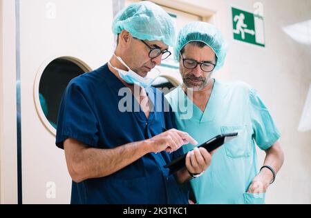 Two surgeons with tablet Stock Photo