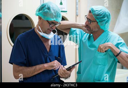 Two surgeons with tablet Stock Photo