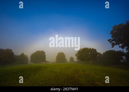Rare White Rainbow Fogbow landscape in the morning Stock Photo