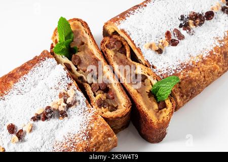 Home made apple strudel, isolated on the white Stock Photo