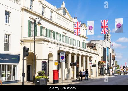 People walking down Colchester High Street past the old Essex and Suffolk Fire Office Colchester town centre Colchester Essex England UK GB Europe Stock Photo