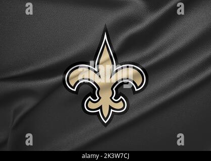 Close-up of Waving Flag with New Orleans Saints NFL American