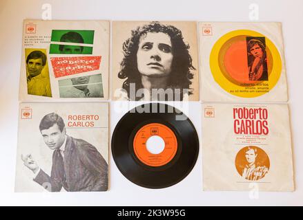 A closeup of several Roberto Carlos vinyl records on white background Stock Photo