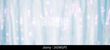 Shiny light blue curtain for Christmas or winter holidays background Stock Photo