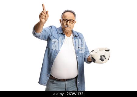 Angry mature man holding a punctured football isolated on white background Stock Photo