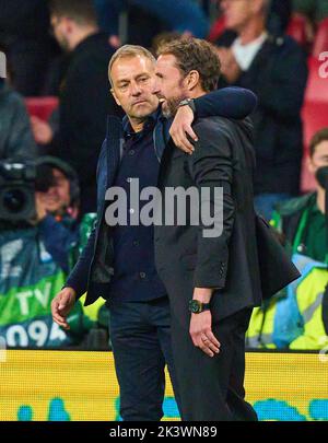 Gareth Southgate head coach of England consoles Harry Kane, during the ...