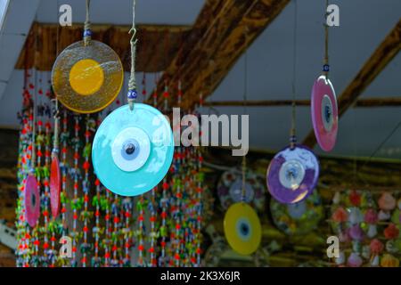 SIRINCE, Izmir, Turkey - January 16, 2022. Various Turkish traditional souvenirs in street shops. Stock Photo