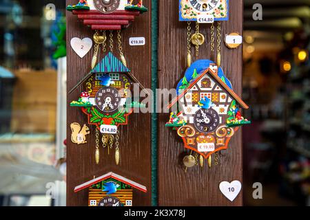 Chalet style cuckoo clocks at a souvenir shop in Freiburg im Breisgau, Germany Stock Photo