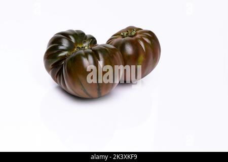 Heirloom Tomato's on a White Background Stock Photo