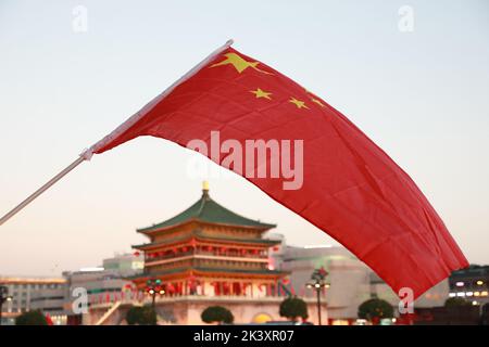 XI'AN, CHINA - SEPTEMBER 28, 2022 - National flags fly on a street in ...