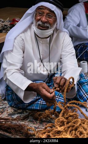 Afro-Arab from Abu Dhabi Making Rope from Coconut Fiber for use in ...