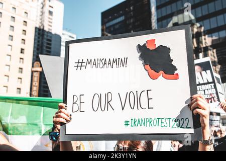 Vancouver, Canada - September 25,2022: Huge rally in support of Iranian protests in front of Vancouver Art Gallery. Woman with a sign Be Our voice Stock Photo