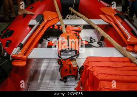 Marikina, Philippines. 26th Sep, 2022. A rescue helmet seen inside the rescue boat. After the death of 5 rescuers in Bulacan Province during the peak of Super Typhoon Noru, Philippine Senate proposed to give a permanent and regular works for the rescuers who is working as casual and contractual workers. Disaster experts says that some rescue workers reported that they didn't have proper benefits, equipment and training for their field. (Photo by Ryan Eduard Benaid/SOPA Images/Sipa USA) Credit: Sipa USA/Alamy Live News Stock Photo