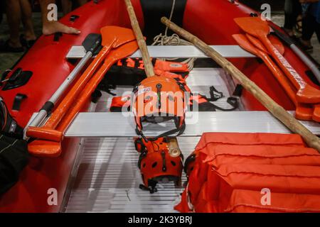 Marikina, Philippines. 26th Sep, 2022. A rescue helmet seen inside the rescue boat. After the death of 5 rescuers in Bulacan Province during the peak of Super Typhoon Noru, Philippine Senate proposed to give a permanent and regular works for the rescuers who is working as casual and contractual workers. Disaster experts says that some rescue workers reported that they didn't have proper benefits, equipment and training for their field. (Credit Image: © Ryan Eduard Benaid/SOPA Images via ZUMA Press Wire) Stock Photo