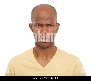 What did you say. An African-Amefrican man frowning and looking puzzled. Stock Photo