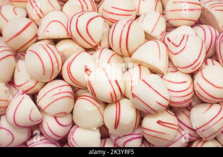 White chocolate praline candies assortment close up Stock Photo