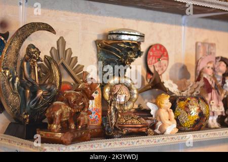Decorative objects on a store shelf. Stock Photo