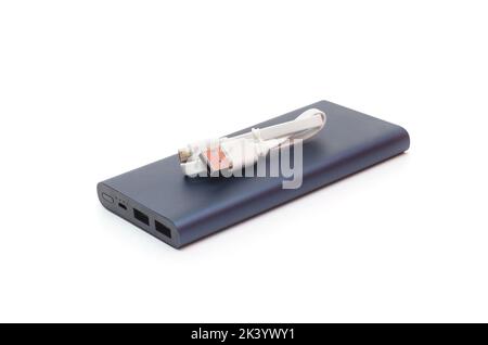 black power bank and charge cable isolated on white Stock Photo