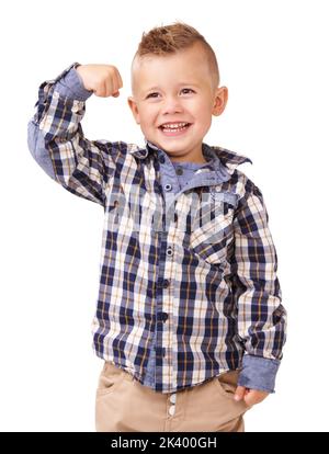 Im superman. An adorable little boy flexing on a white background. Stock Photo