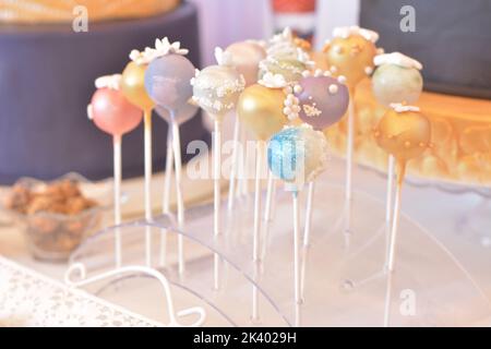 Cake pops with blue, purple and gold glitter Stock Photo