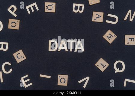DATA word written on dark paper background. DATA text on dark for your designs, concept. Stock Photo
