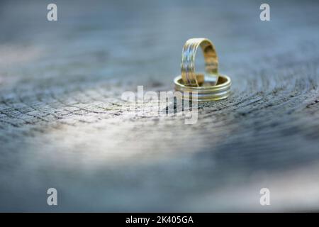 Gold rings. Jewelery. Weeding concept. Two gold rings. Stock Photo